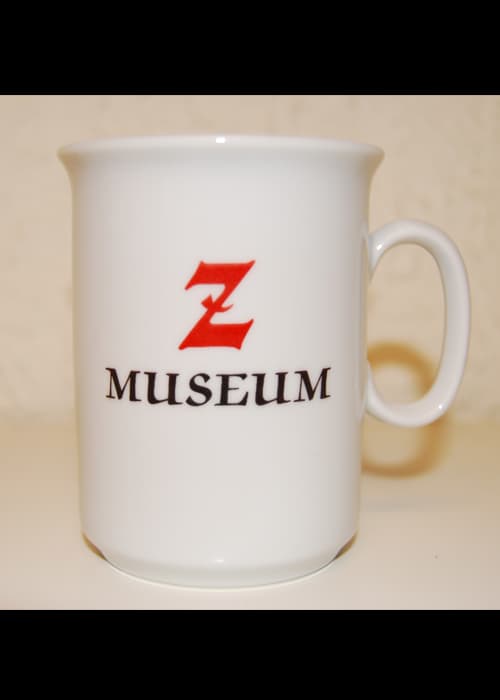 Kopp med museets logo